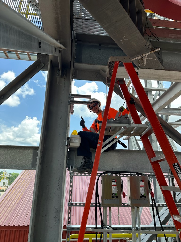 Sister Nadine installing a light